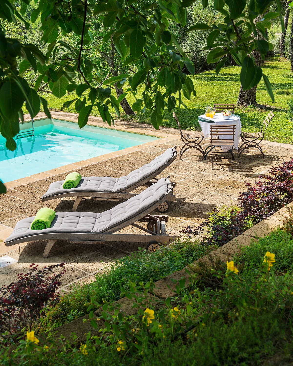 Comfy sun loungers near the pool